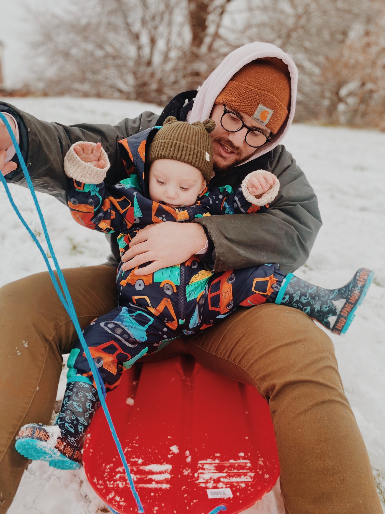 Joe Wilson sledging with his children